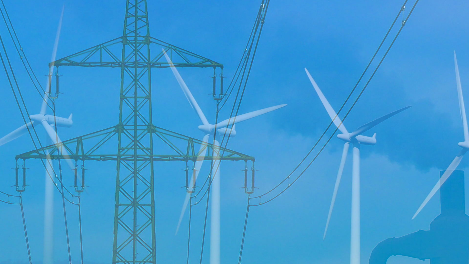 hochspannungsleitung, windpark und schornstein unter blauem Himmel